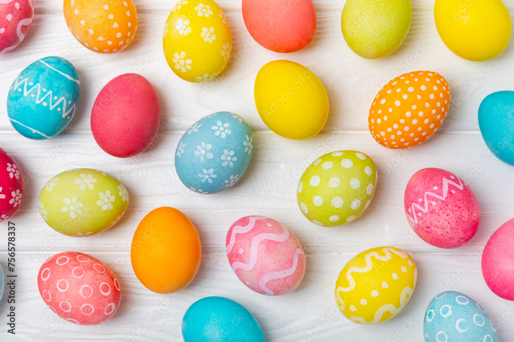 Easter eggs on a bright background. Easter celebration concept. Colorful easter handmade decorated Easter eggs. Place for text. Copy space.
