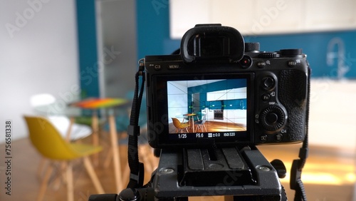 Bild auf Leinwand Real estate photographer taking pictures and videos  at house  in apartment livi