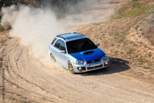 Rally Car in a Turn and a Cloud of Dust 23