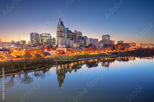 Nashville  Tennessee  USA. Cityscape image of Nashville  Tennessee  USA downtown skyline with reflection of the city the Cumberland River at spring sunset.