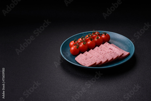 Delicious canned pink ham with salt, spices and herbs photo