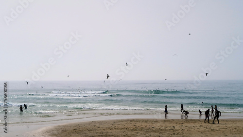 Sãp Pedro de Moel, Leiria, Portugal.
People enjoying a beach day in the beach on the west coast of Portugal.