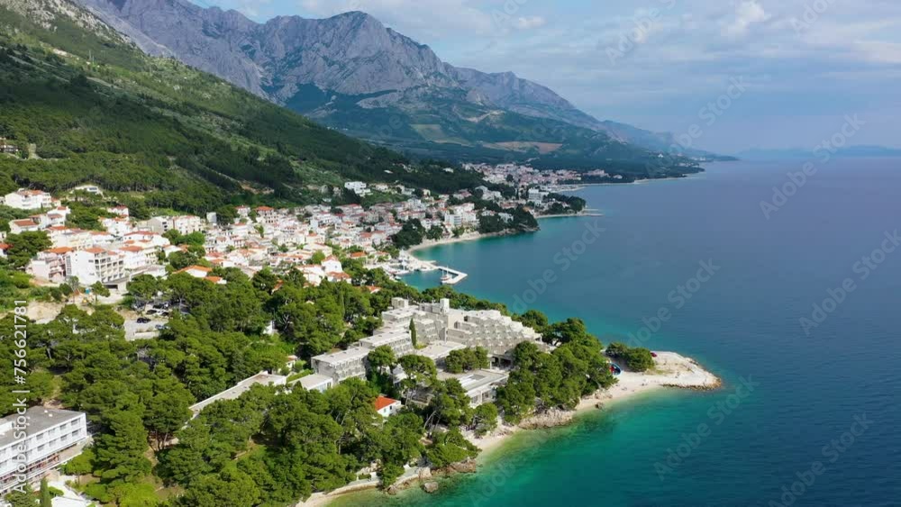 Beautiful Brela on Makarska riviera, Croatia. Adriatic Sea with amazing turquoise clean water and white sand. Aerial view of Brela beach and waterfront on Makarska riviera, Dalmatia region of Croatia. Beautiful Brela on Makarska riviera, Croatia. Adriatic Sea with amazing turquoise clean water and white sand. Aerial view of Brela beach and waterfront on Makarska riviera, Dalmatia region of Croatia.