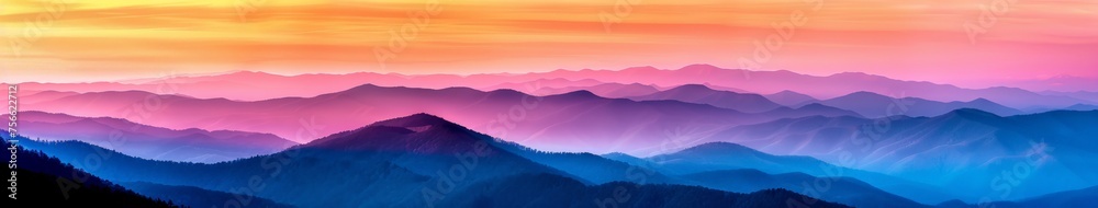 Majestic Mountain Range Under Colorful Sky