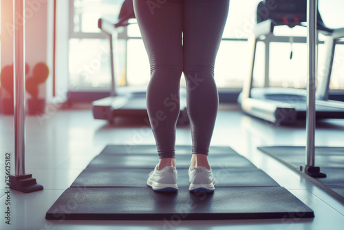 Female legs in the gym  healthy lifestyle