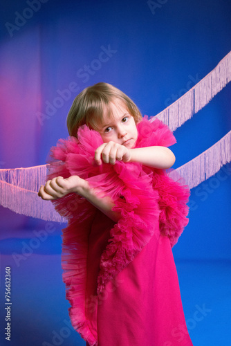 stylish children's photography, little girl in a pink dress