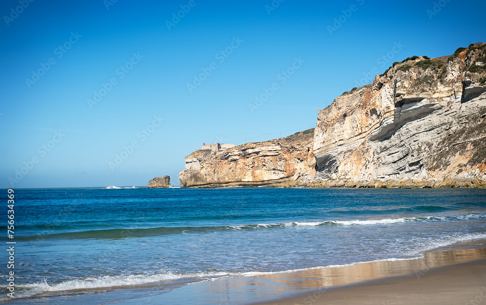 Wavy sea, panoramic view of the main beach Praia de Nazare in Nazare, Portugal