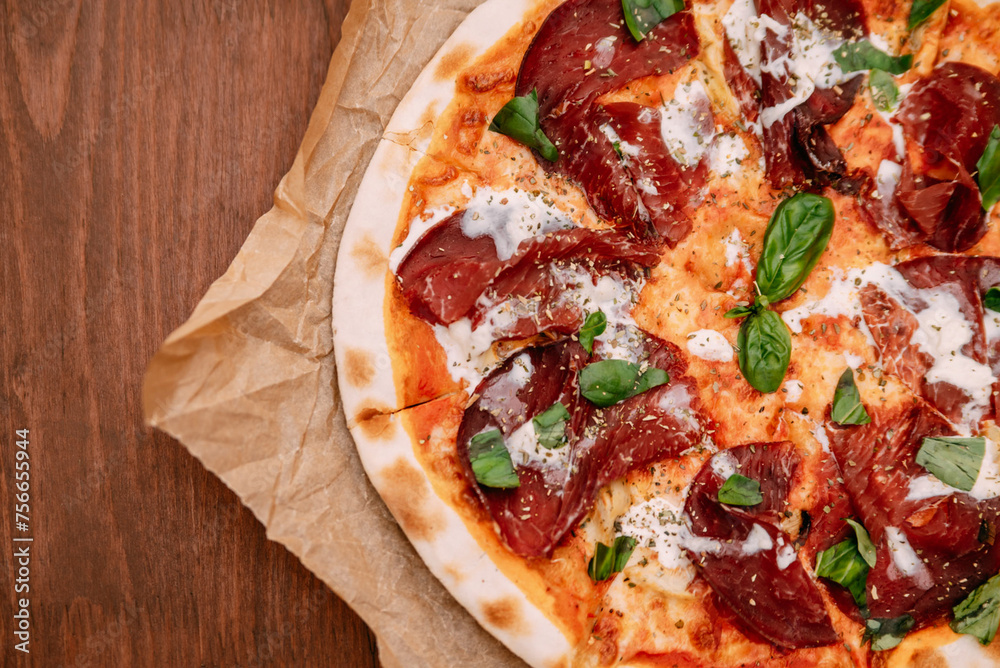 pizza with basil and meat pizza with basil and meat