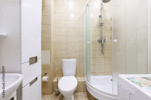 modern bathroom room with toilet and washing machine