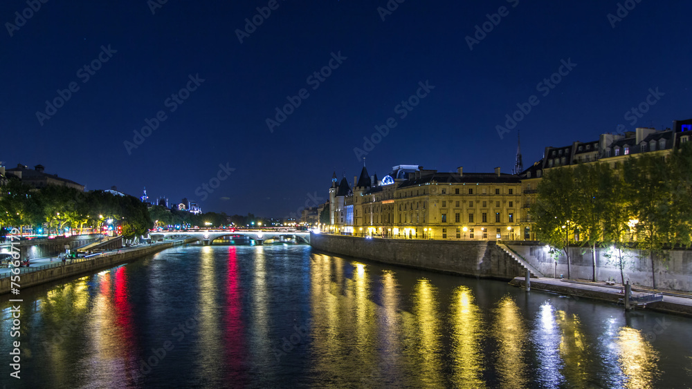Cite island view with Conciergerie Castle and Pont au Change, over the Seine river timelapse hyperlapse. France, Paris