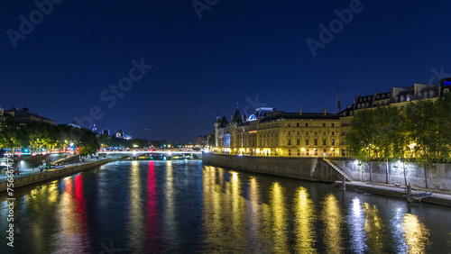 Cite island view with Conciergerie Castle and Pont au Change, over the Seine river timelapse hyperlapse. France, Paris