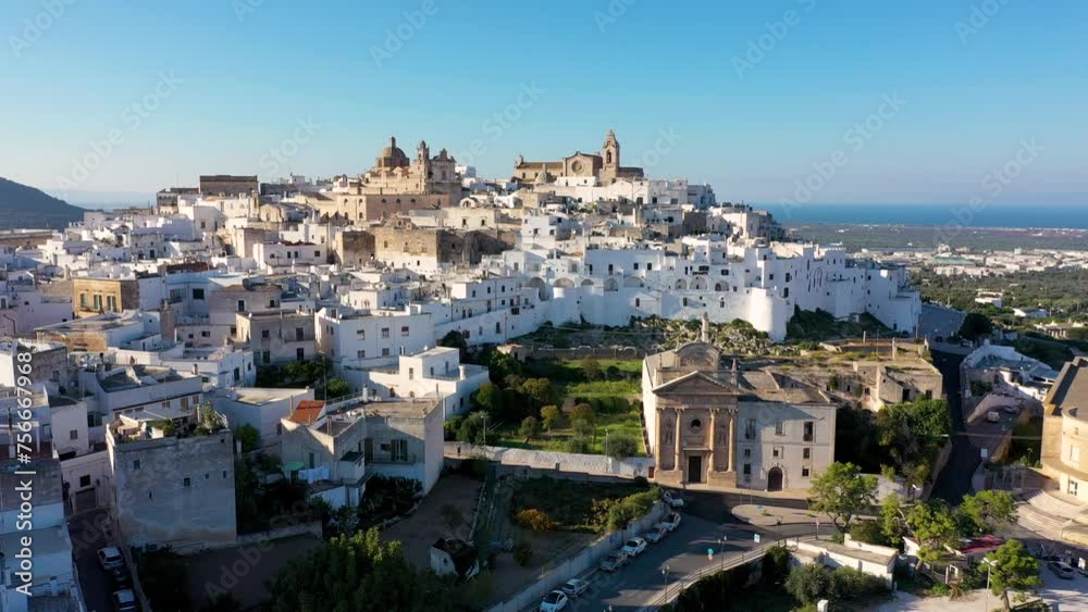 View of Ostuni white town, Brindisi, Puglia (Apulia), Italy, Europe. Old Town is Ostuni's citadel. Ostuni is referred to as the White Town. Ostuni white town skyline and church, Brindisi, Italy. View of Ostuni white town, Brindisi, Puglia (Apulia), Italy, Europe. Old Town is Ostuni's citadel. Ostuni is referred to as the White Town. Ostuni white town skyline and church, Brindisi, Italy.