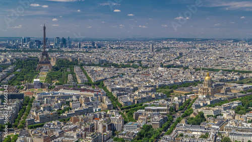 Aerial view from Montparnasse tower with Eiffel tower and La Defense district on background timelapse in Paris, France.