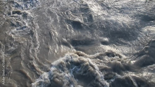 River in flood with rushing water