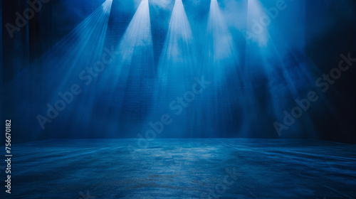abstract dark blue background illuminated by soft studio light, with an empty stage at the forefront