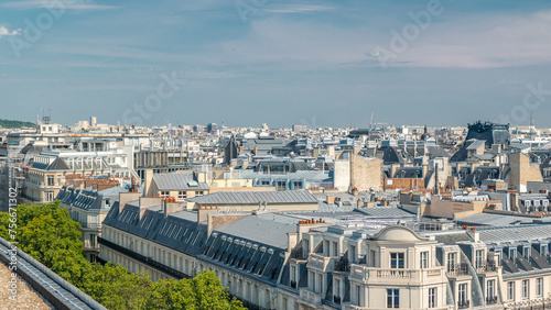 Cityscape view on the beautiful buildings timelapse from gallery lafayette terrace in Paris