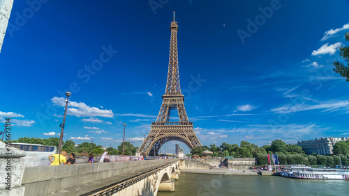 Eiffel Tower with bridge over Siene river in Paris timelapse hyperlapse  France