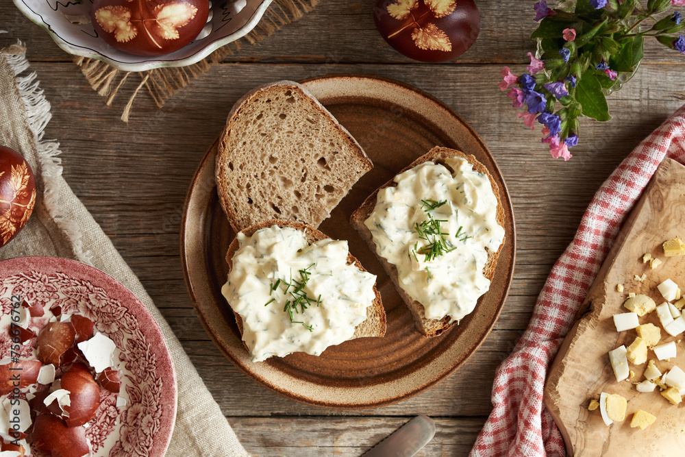 Three slices of sourdough bread with spread made from leftover hard-boiled Easter eggs Three slices of sourdough bread with spread made from leftover hard-boiled Easter eggs