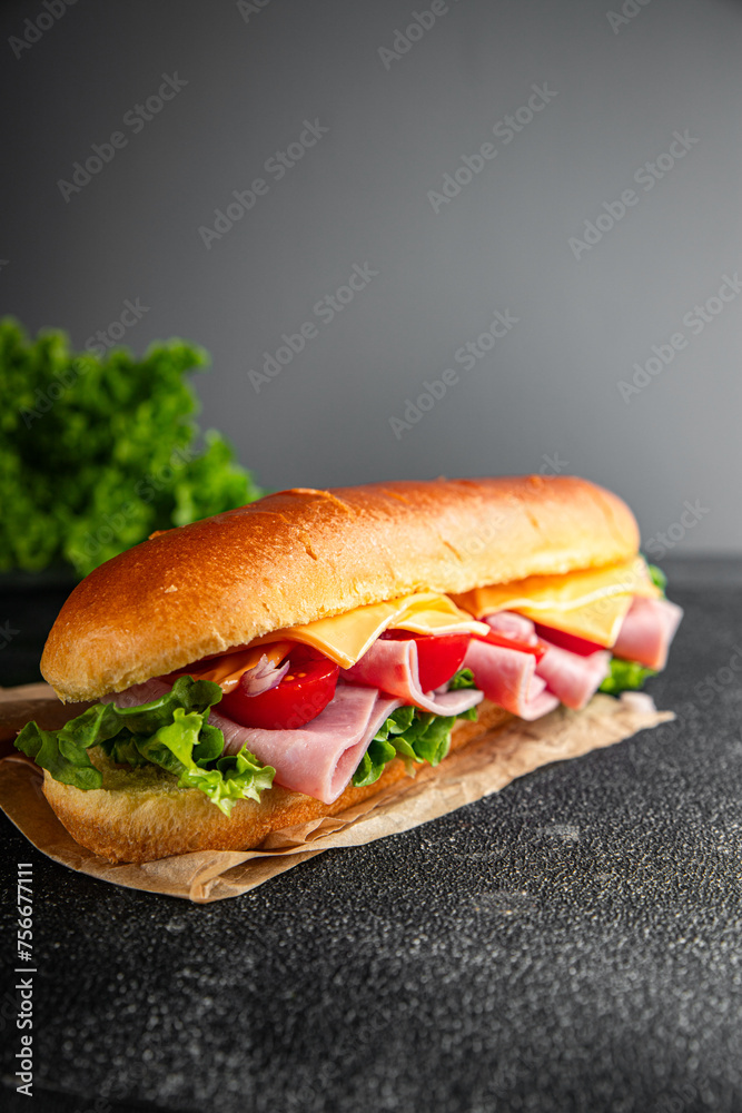 ham sandwich sliced meat, cheese, lettuce, tomato, vegetable, bun bread fresh food tasty eating meal food snack on the table copy space food background rustic top view ham sandwich sliced meat, cheese, lettuce, tomato, vegetable, bun bread fresh food tasty eating meal food snack on the table copy space food background rustic top view