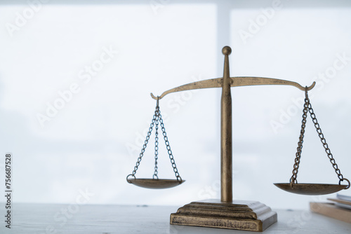 Brass scales are placed on lawyers desks in legal advice offices as a symbol of fairness and integrity in the High Court decision making. Brass scales were used as a symbol of honesty and justice.