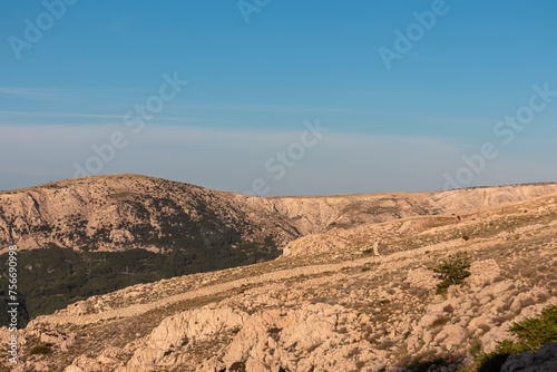Panoramic view of dry stone walls mrgari on moon plateau seen from mountain top Hlam in Baska, Krk Island, Primorje-Gorski Kotar, Croatia, Europe. Hiking trail on barren deserted dry terrain. Ruins