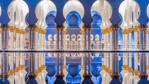 Sheikh Zayed Grand Mosque illuminated at night timelapse, Abu Dhabi, UAE. photo