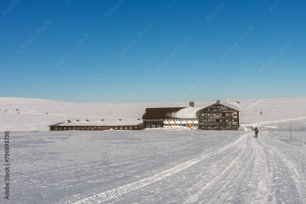 Meadow Hut , ski lodge,  krkonose mountains, Czech Republic. Winter sunny day.
