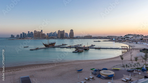 View from Katara Beach day to night timelapse in Doha, Qatar, towards the West Bay and city center