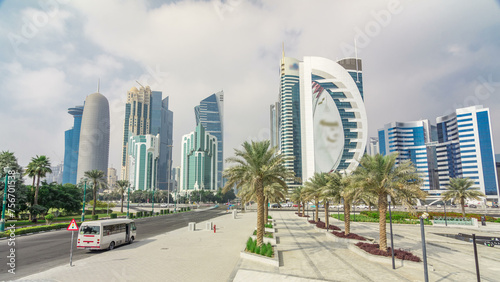 The high-rise district of Doha with traffic on intersection timelapse hyperlapse