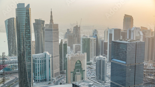 Skyscrapers before sunset timelapse in the skyline of commercial center of Doha  the capital Qatar