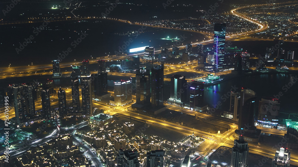 Dubai downtown night with city lights from above timelapse