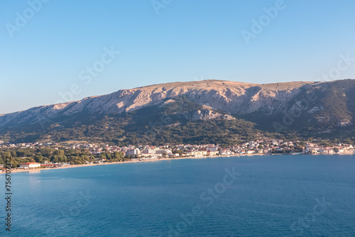 Panoramic view of majestic coastline of Mediterranean Adriatic Sea in coastal town Baska, Krk Island, Primorje-Gorski Kotar, Croatia, Europe. Aerial vistas from idyllic hiking trail in summer