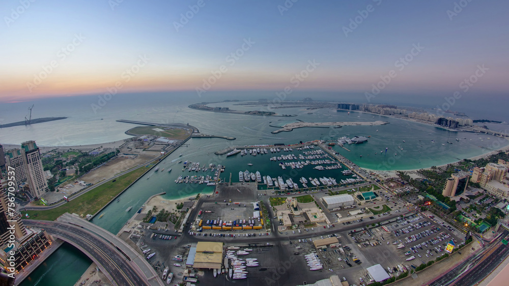 Aerial view from Dubai Marina panorama from day to night transition timelapse