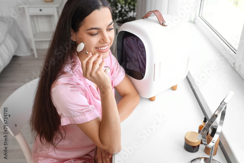 Beautiful young woman with ...