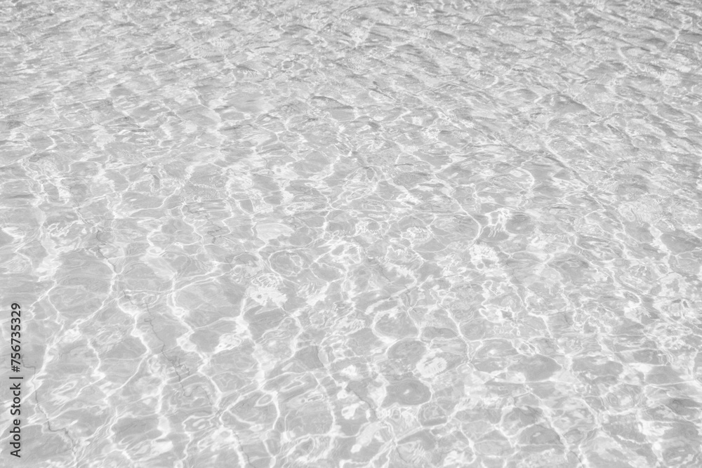white water texture surface with ripples with bubbles and sun light reflection. 
