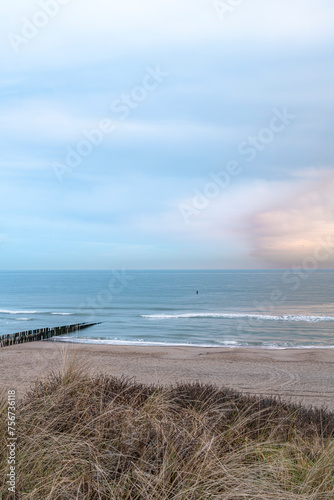 Beach near Domburg town in spring fresh morning with cloudy sky