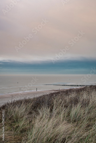 Beach near Domburg town in spring fresh morning with cloudy sky