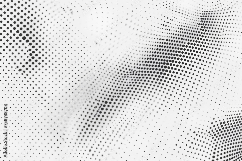 Halftone dots in black and white, suitable for graphic design projects