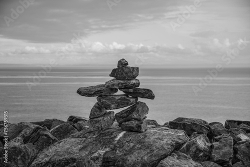 La Malbaie, Canada - August 17 2020: Stunning landscape view with the prayer stones by the saint lawrence river in La Malbaie in Quebec photo