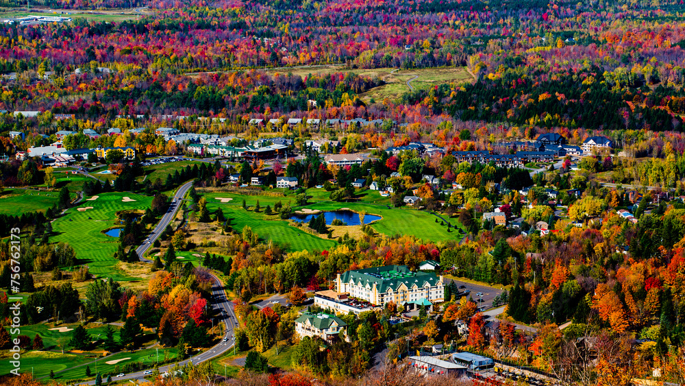 Fototapeta premium Bromont, Canada - Oct. 11 2020: Bird view from Bromont mountain in Quebec Autumn season