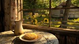 a plate of pastries sitting on a table in front of a window with a view of a sunflower field.