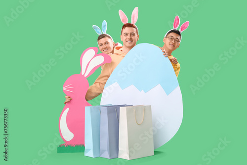 Young men in bunny ears wit...