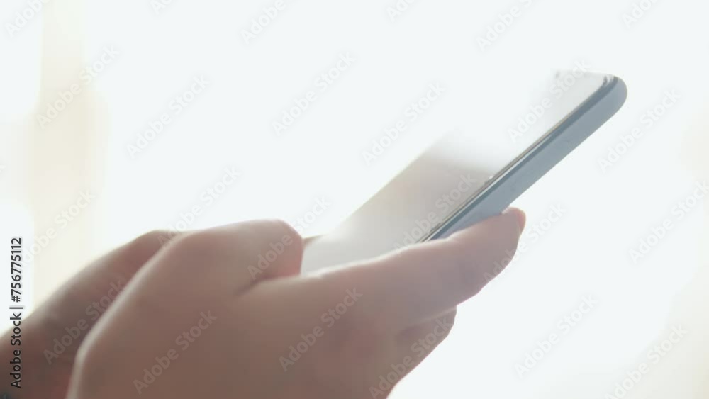 Hands Using Smartphone In Everyday Life. Close up. Hands Using Smartphone In Everyday Life. Close up.