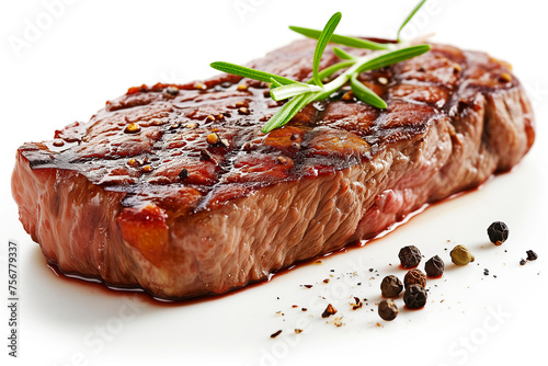delicious Grilled big steak meat with rozemary and peper on a white background. photo