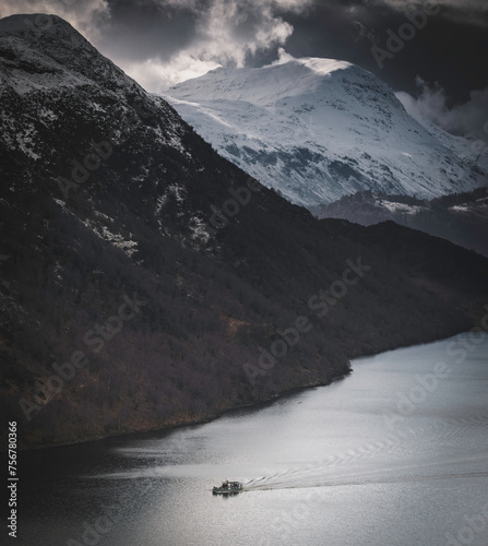 steam boat in landscape with snow and clouds photo