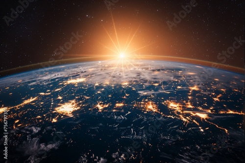 Panoramic view on planet Earth globe from space with rising sun. Glowing city lights, light clouds. 
