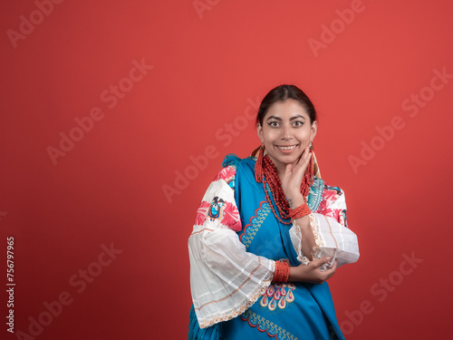 Latin girl of Kichwa origin with a red background and a face of disbelief. photo