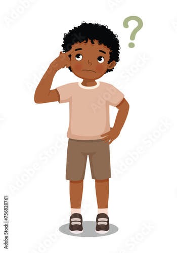 Cute little African boy thinking confused with question mark