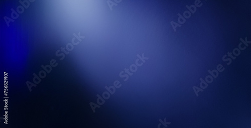 trama di sfondo blu scuro con vignetta nera in vecchio design vintage con bordi testurizzati, parete color verde acqua scuro ed elegante con riflettori luminosi al centro. photo