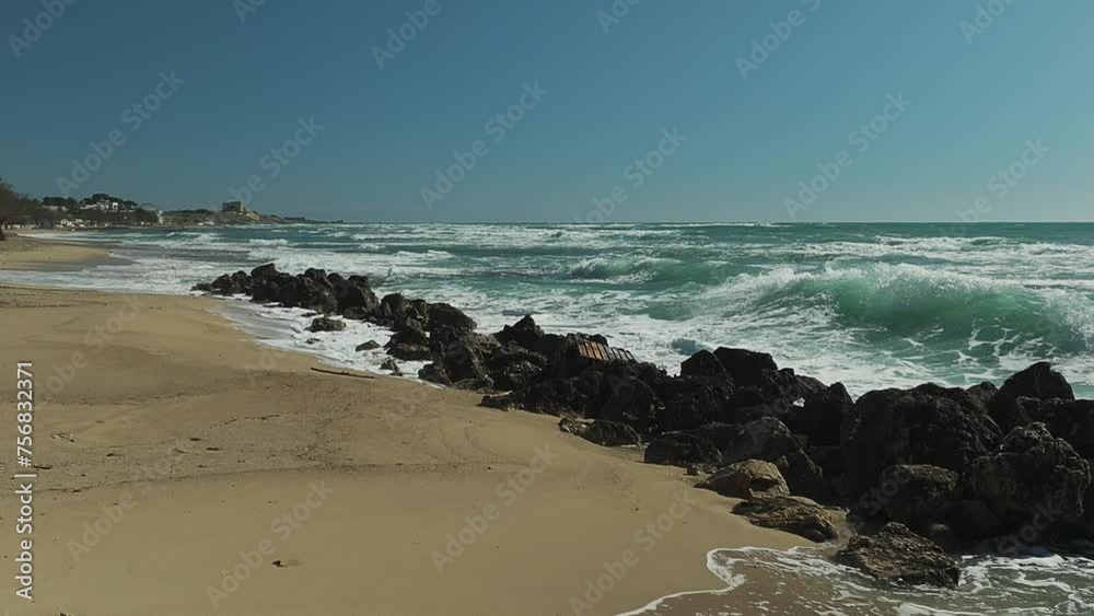 Rough sea with waves hitting the cliff in slow motion 2 Rough sea with waves hitting the cliff in slow motion 2